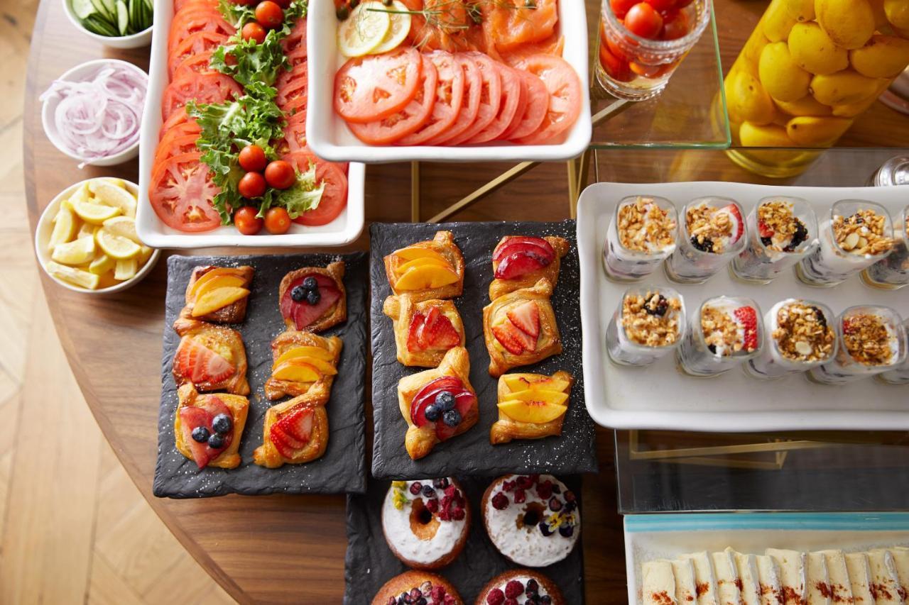 The London West Hollywood At Beverly Hills Екстер'єр фото A buffet of food